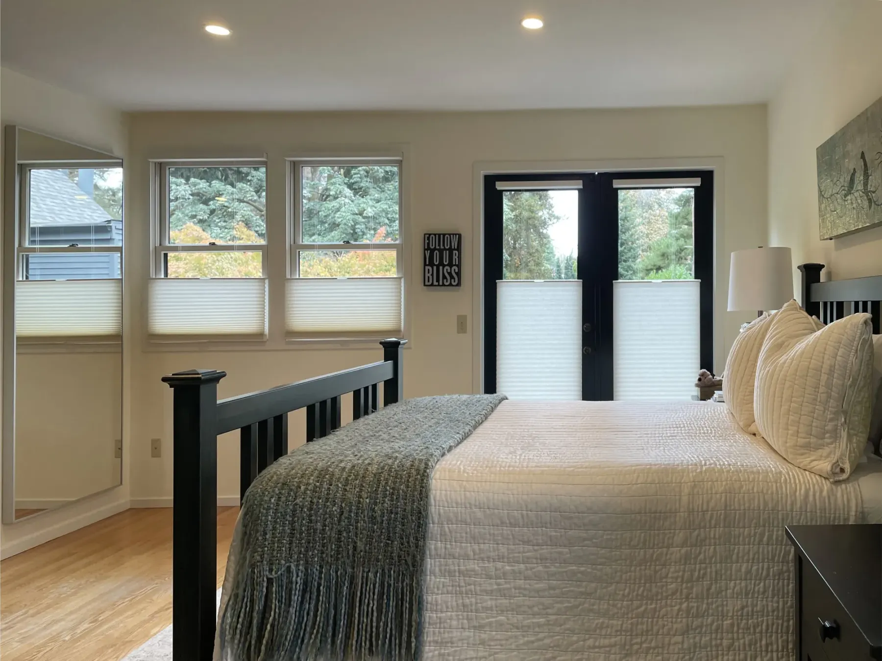 Semi-sheer Architella honeycomb shades with top-down/bottom-up operation in a Madison Park Seattle bedroom