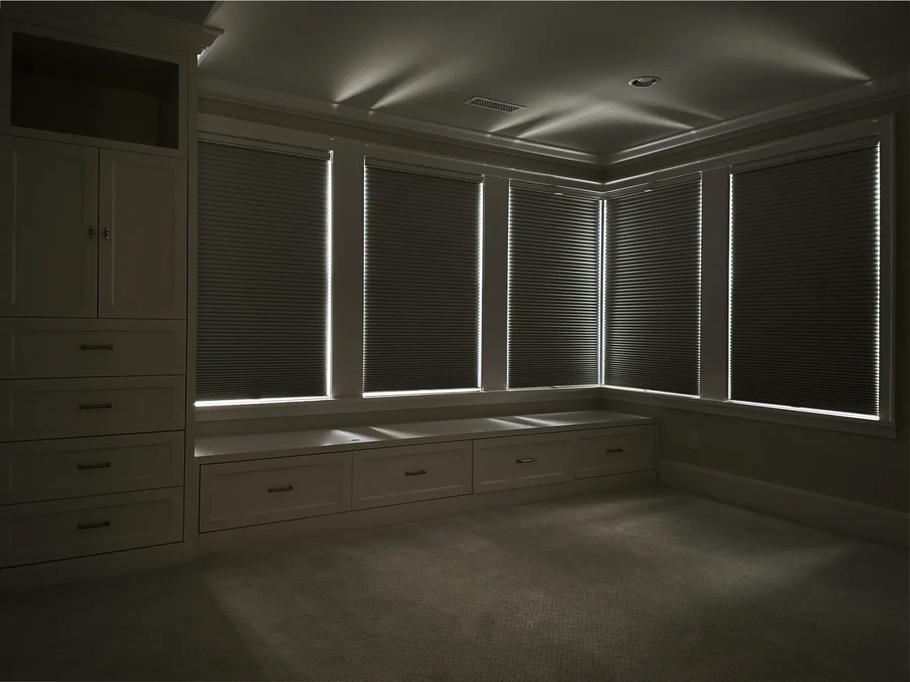 Light seepage around blackout honeycomb shades in a Seattle bedroom