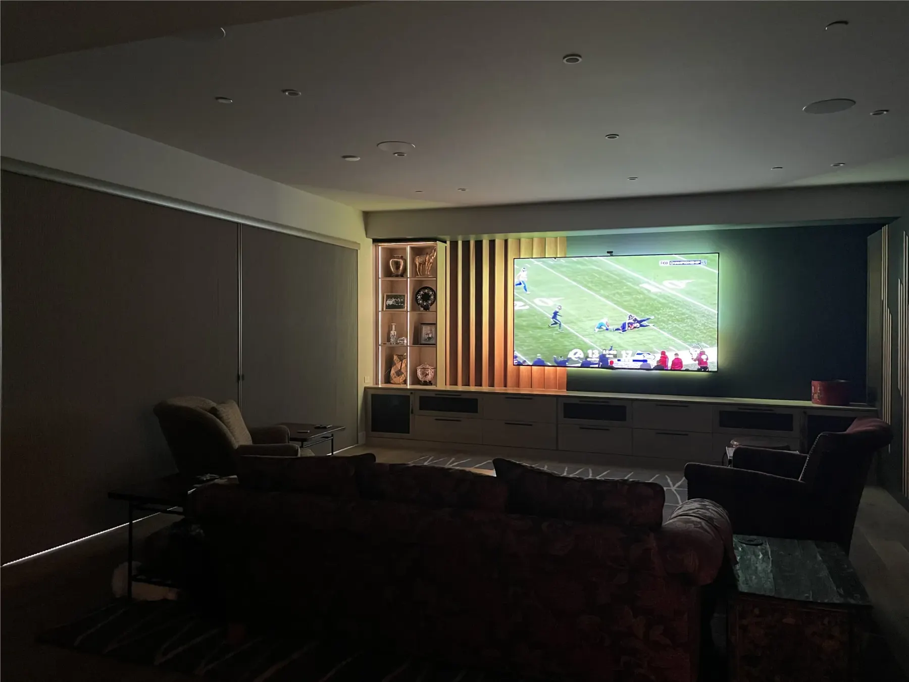 Blackout Vertiglide® honeycomb shades on a sliding glass door in a Mercer Island media room