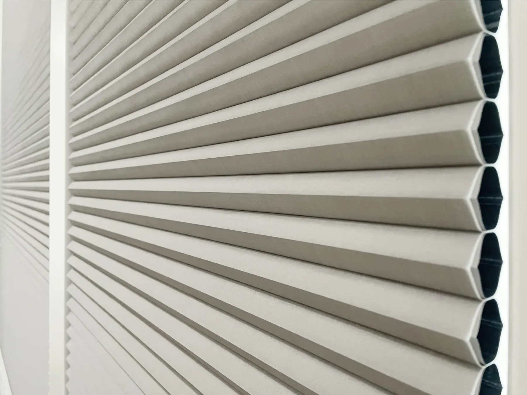 Close-up of Hunter Douglas Duette® Architella® honeycomb shades installed in Issaquah home