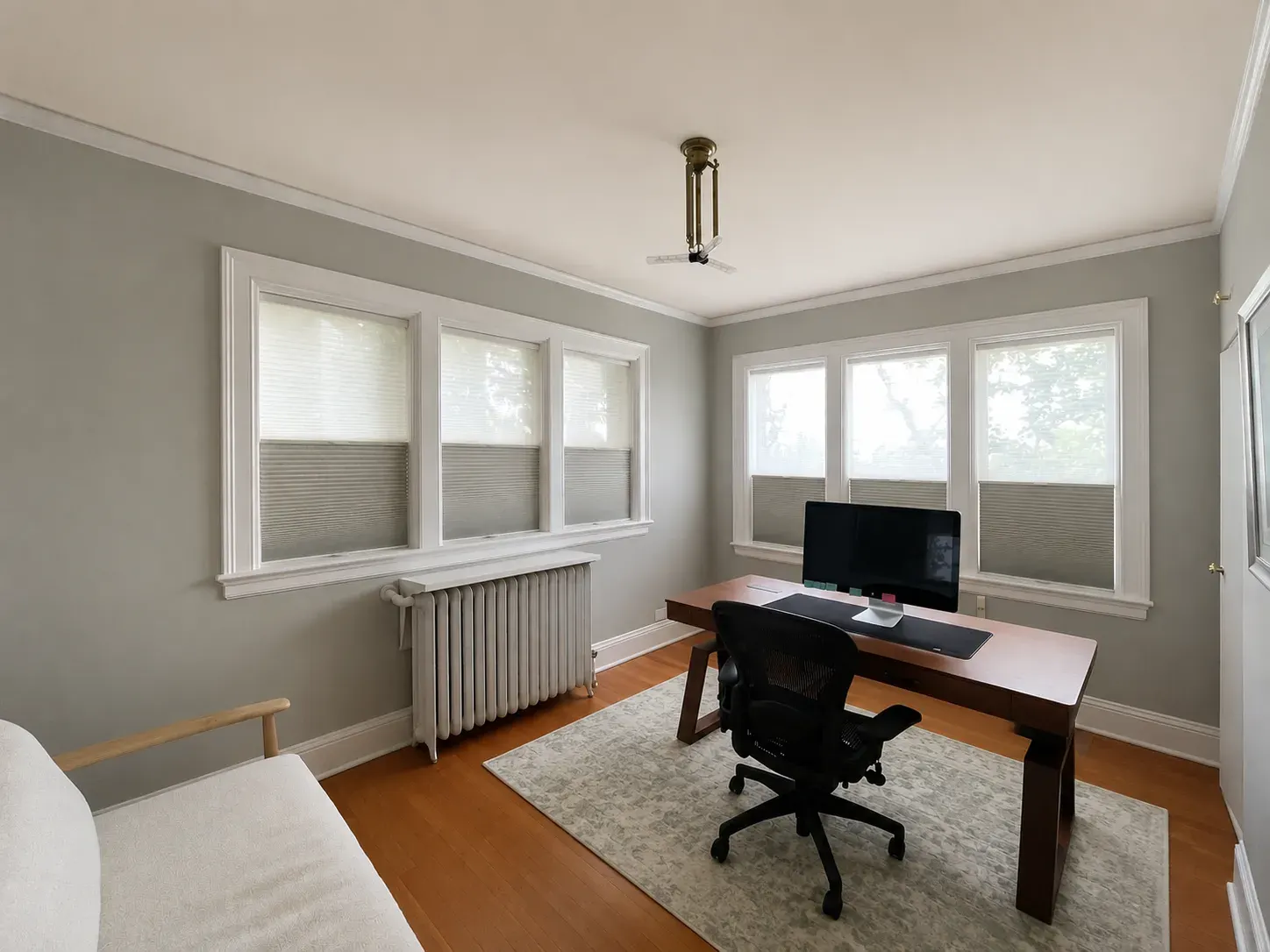 Dual honeycomb shades with sheer and room darkening fabrics in a Seattle home office