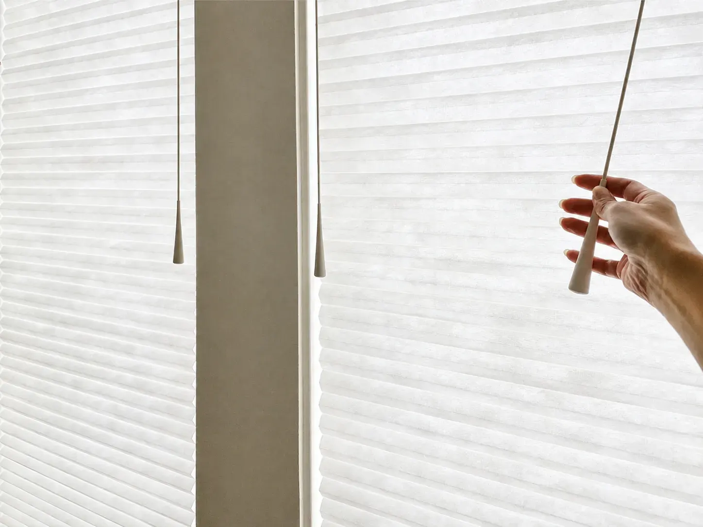 Top-down bottom-up honeycomb shades with UltraGlide wand in a Bellevue home