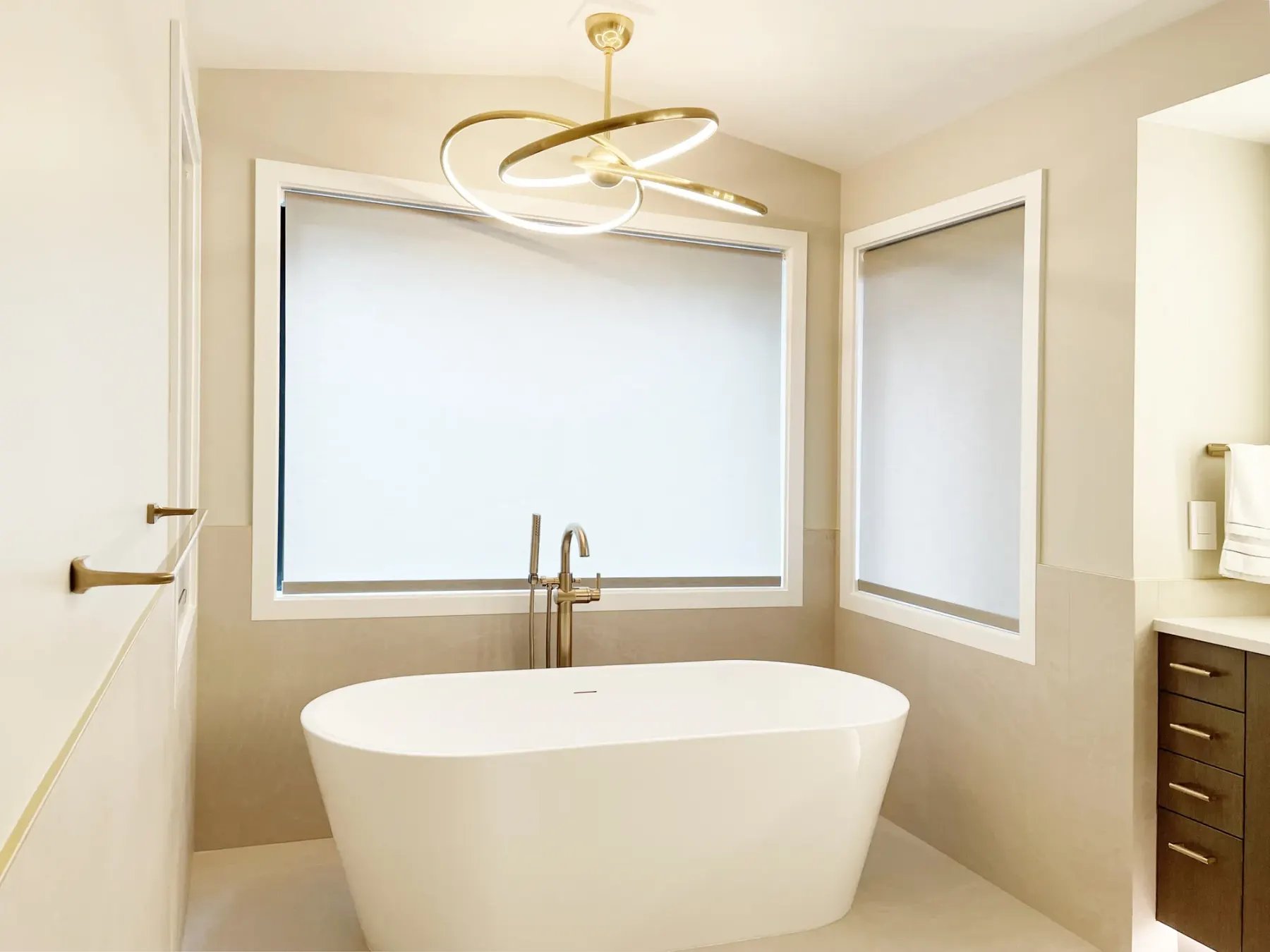 Motorized roller shade installed in a Redmond bathroom