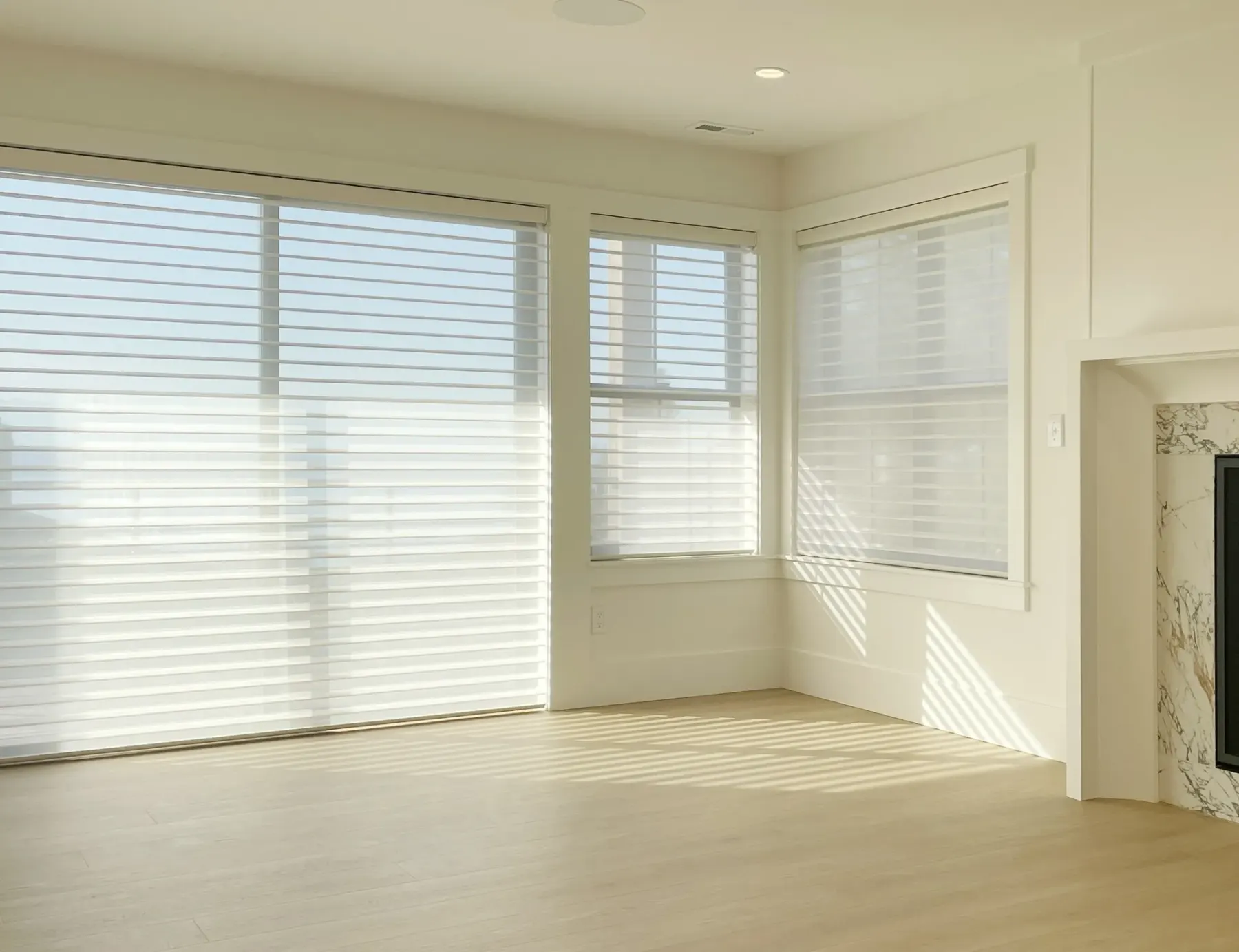 Motorized Silhouette® sheer shades on a sliding glass door in a Shoreline home