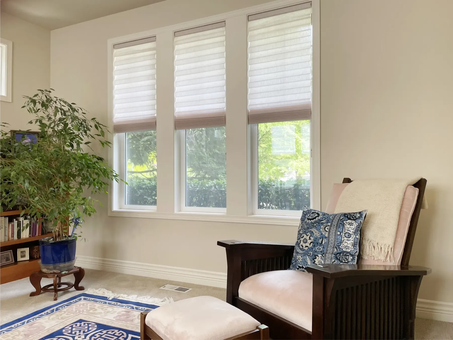 Blush pink roman shades in a living room in Snoqualmie