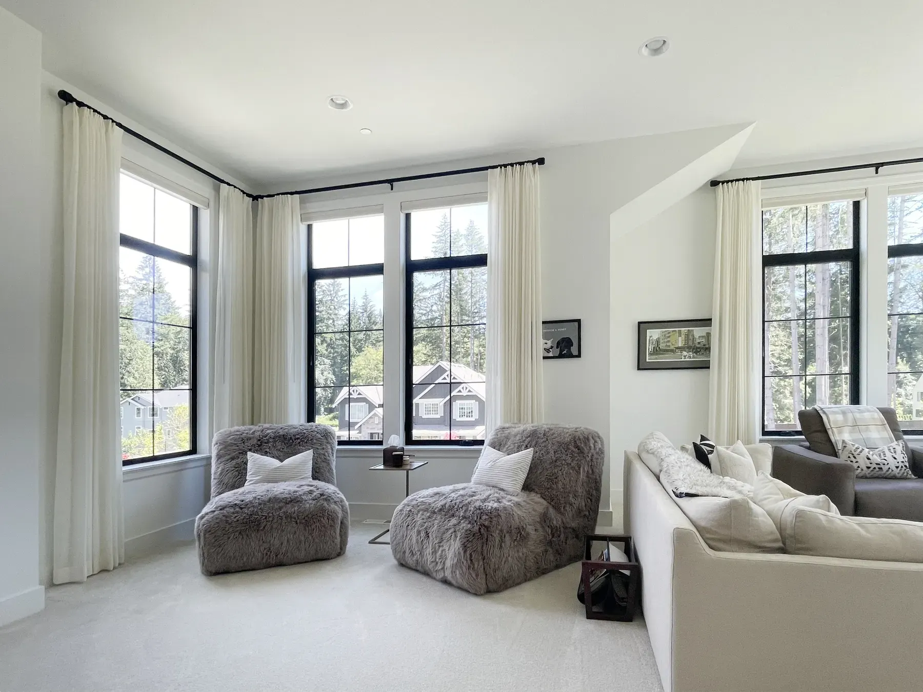 Sheer drapery stacked open in a Woodinville bonus room