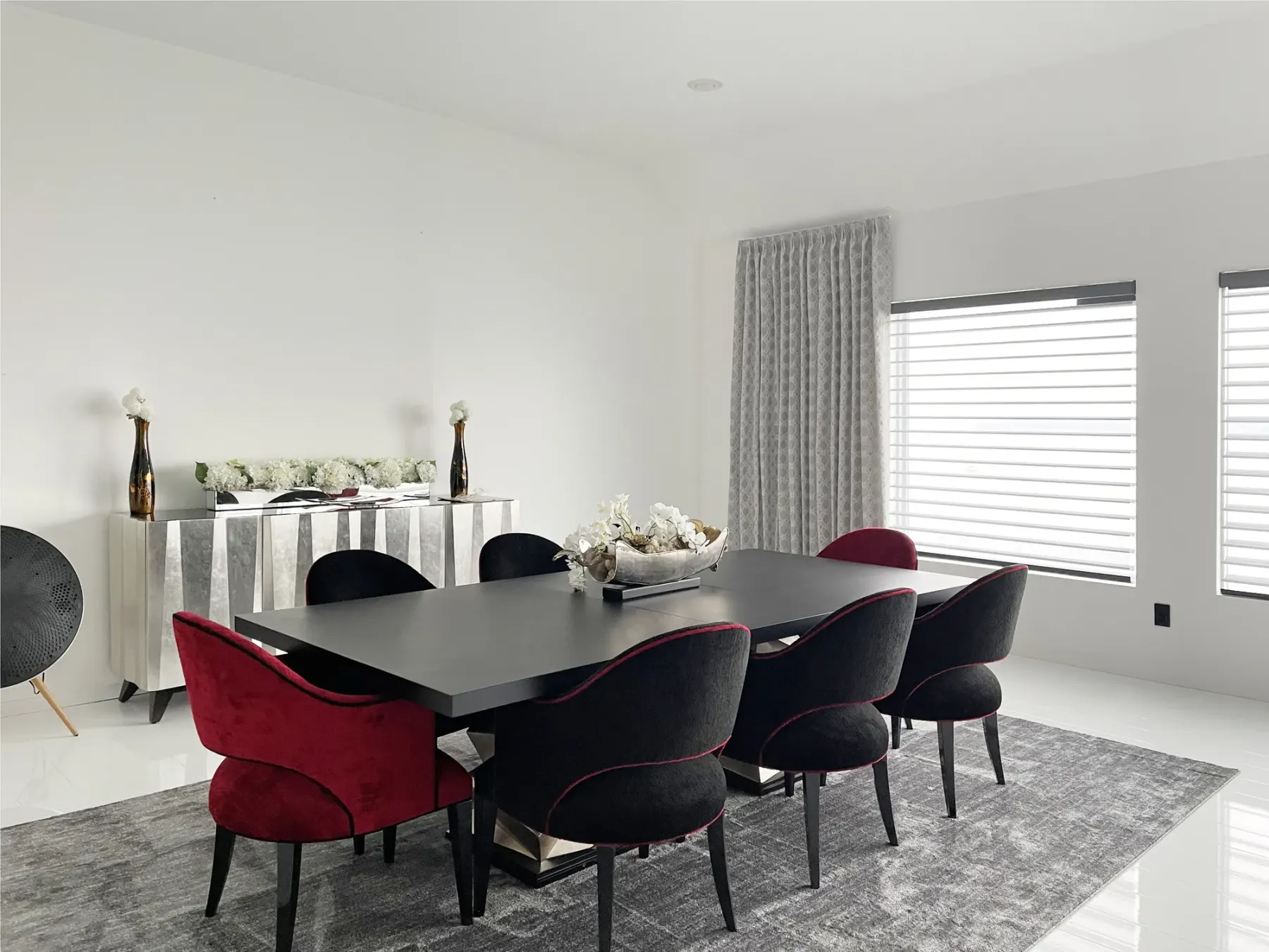 Motorized Hunter Douglas Silhouette sheer shades for a waterfront home