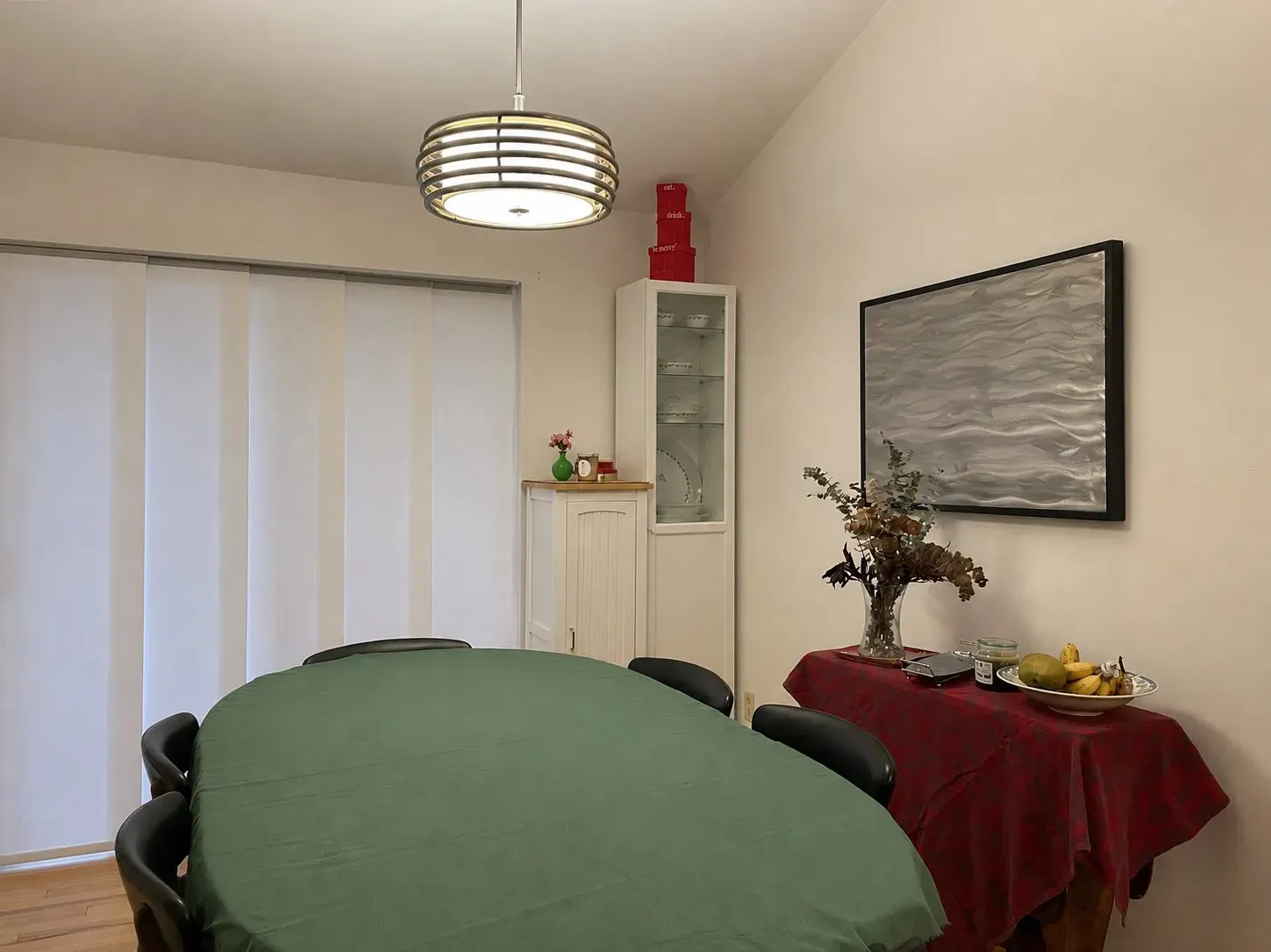 Sliding panels in a solar screen fabric for a sliding glass door in a Seattle dining room