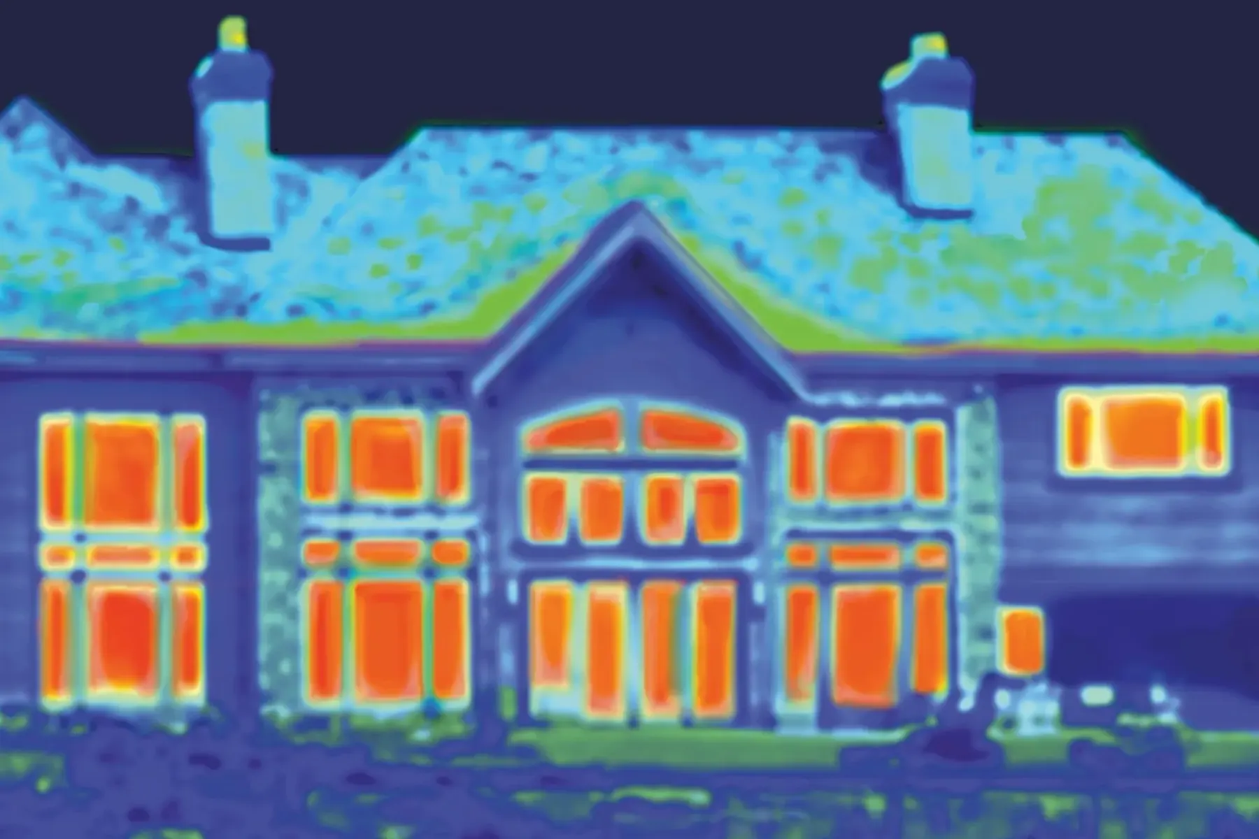 Thermal image showing heat loss through windows and other areas of a home