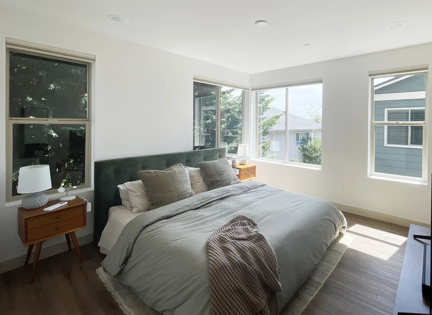 Motorized Blackout Honeycomb Shades Raised for a Bedroom in Seattle