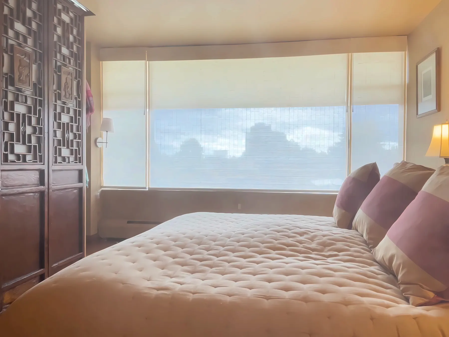 Dual Woven Wood and Roller Shades for a Bedroom in Madison, Seattle
