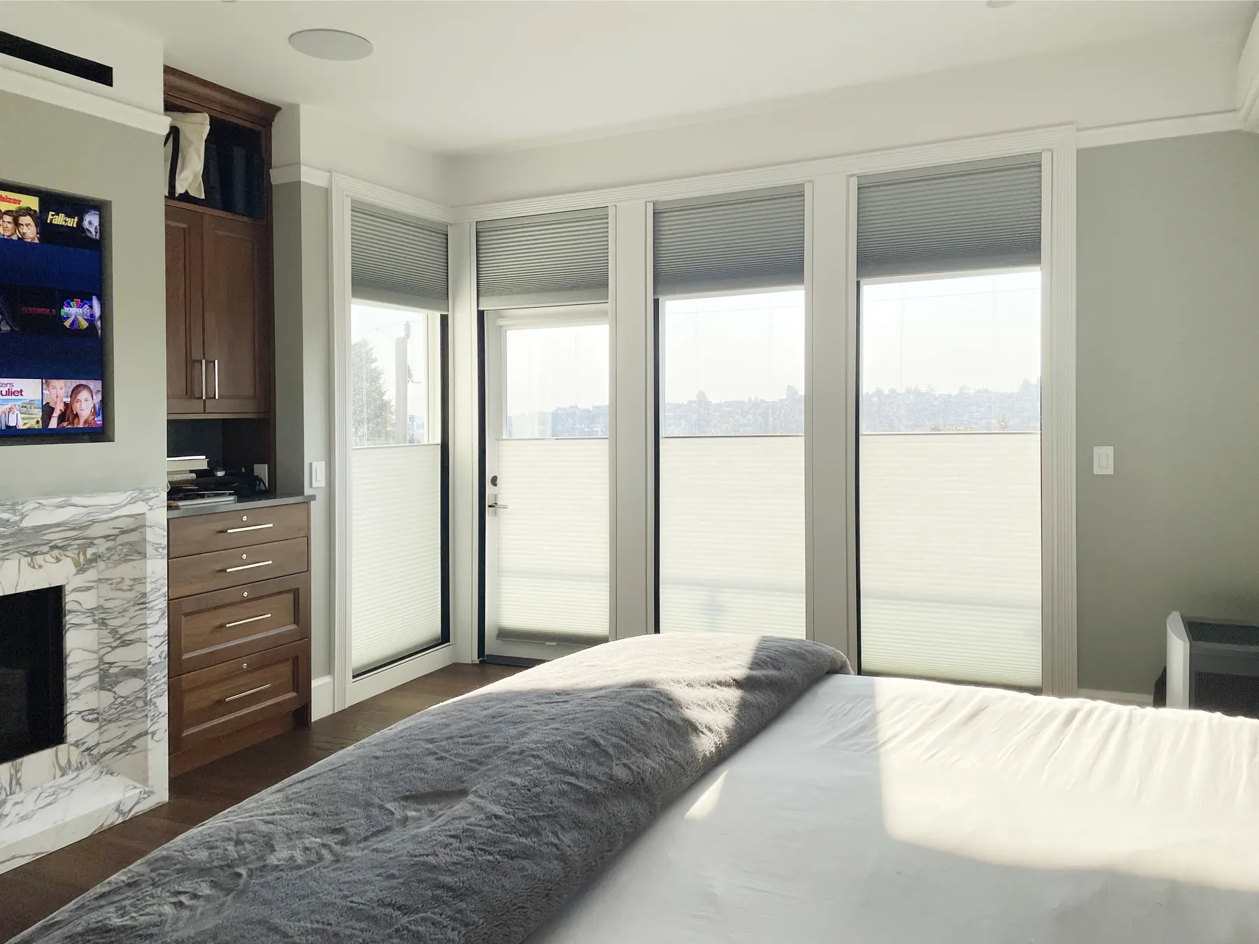 Motorized LightLock Honeycomb Shades for a Primary Bedroom in Seattle, WA