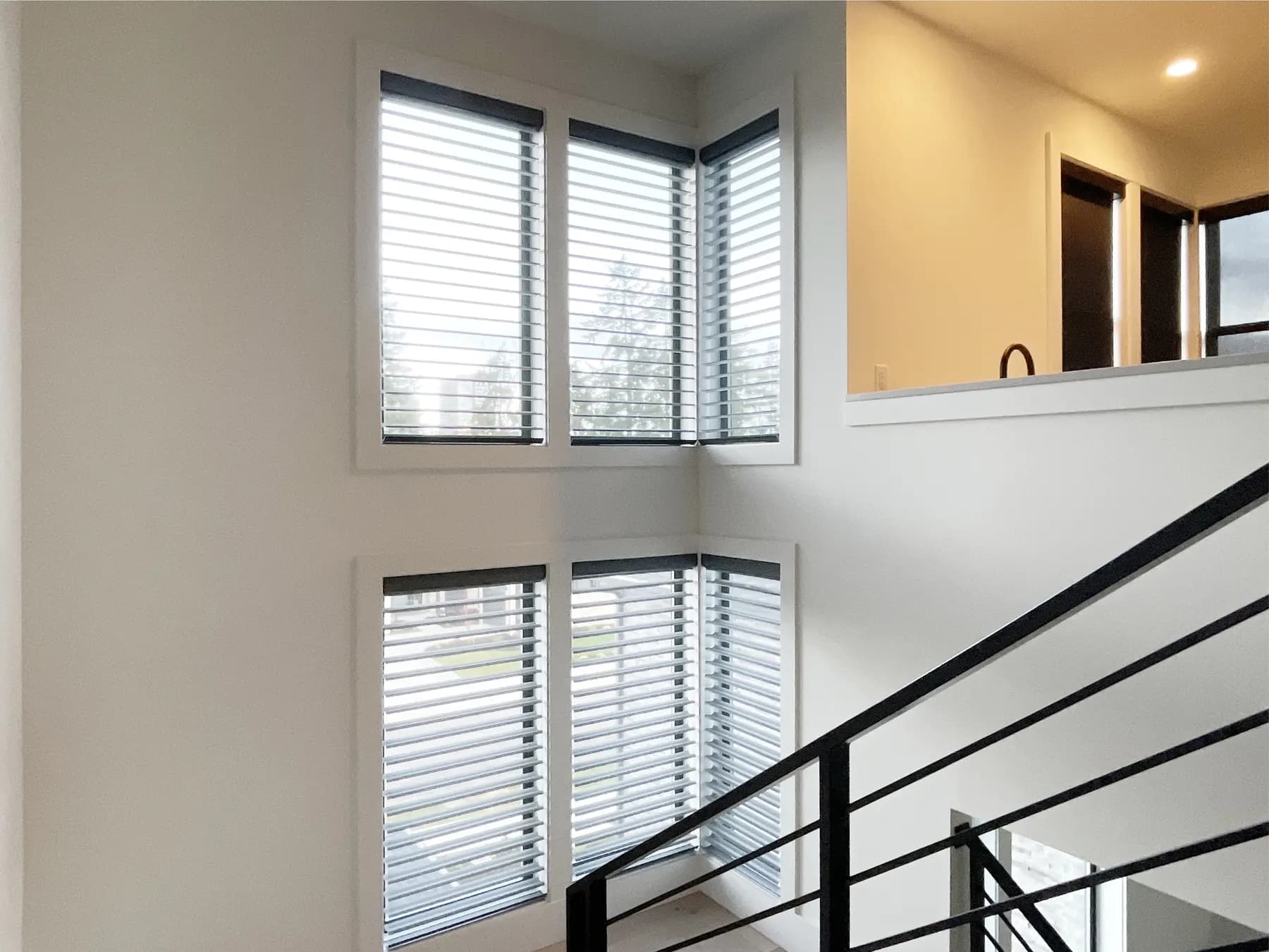 Motorized Silhouette Sheer Shades for Stairway Landing Windows in Bellevue