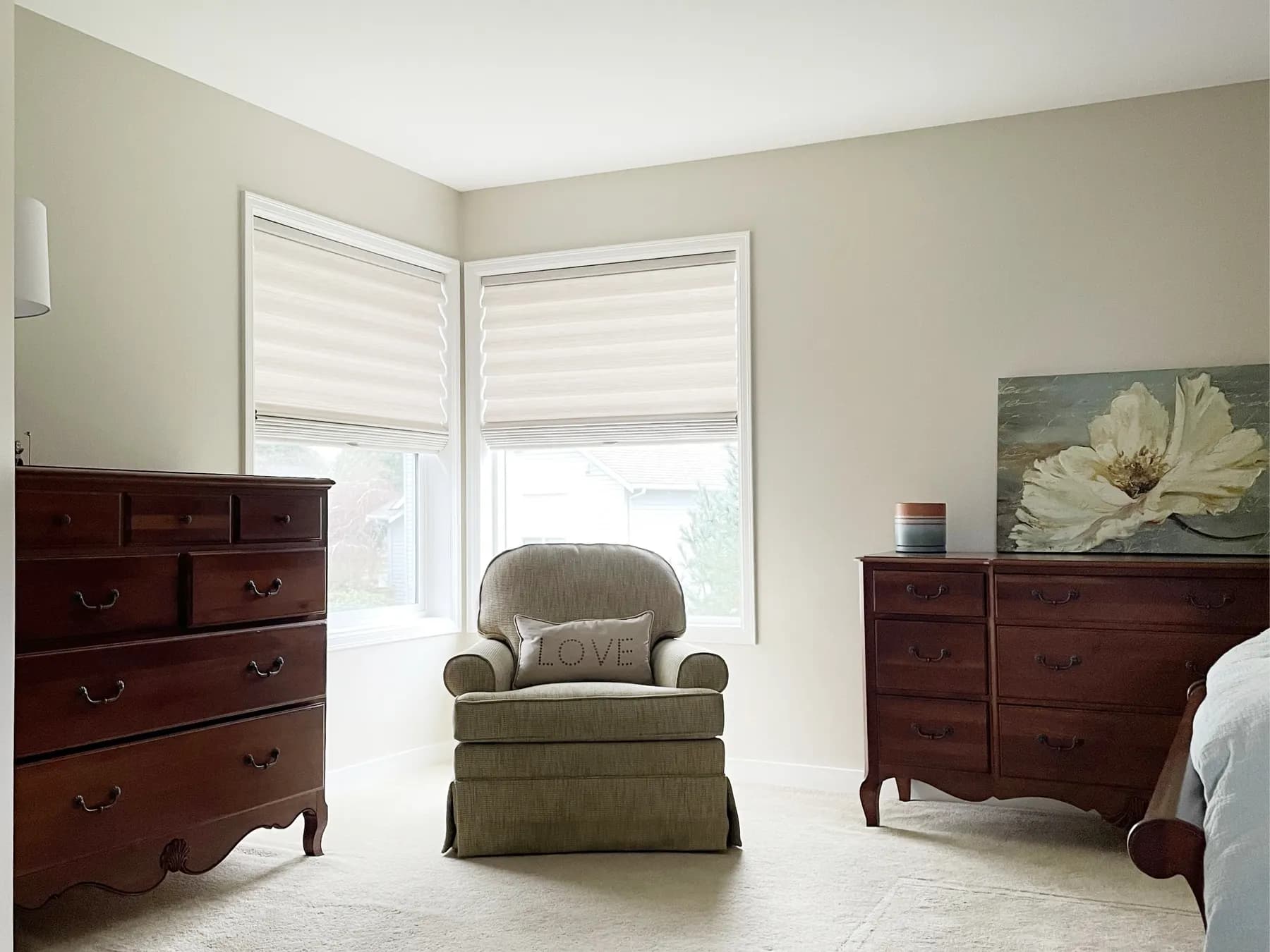 Roman Shades Partially Raised in a Remodeled Primary Bedroom in Brier