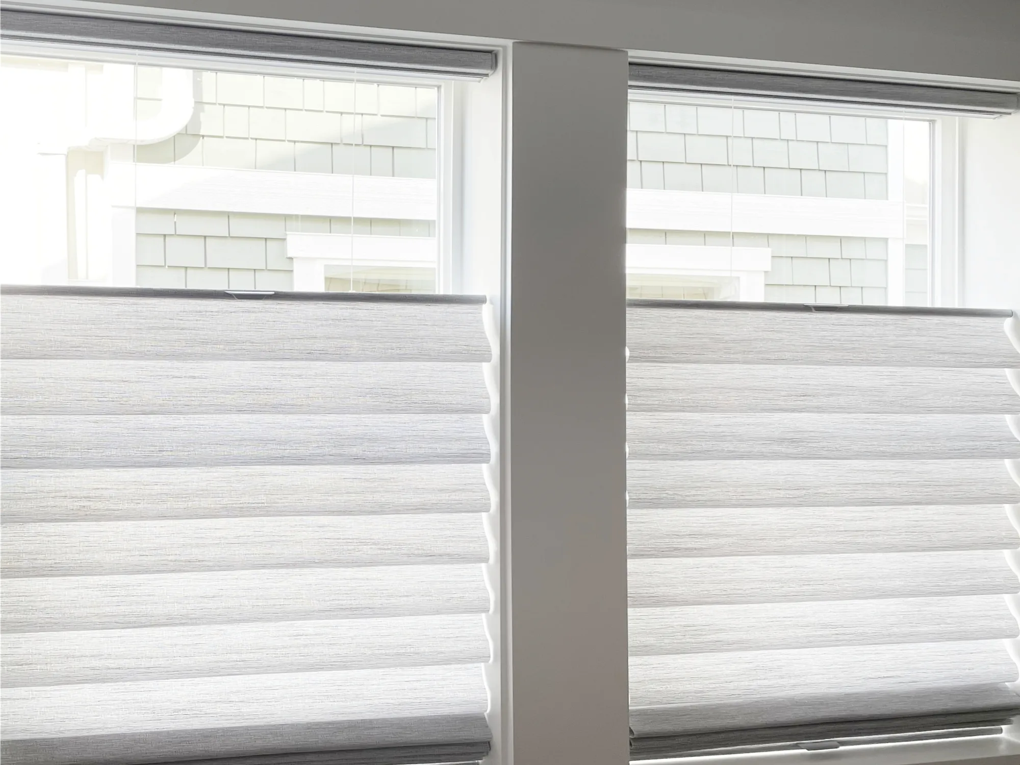 Custom Roman shades with top-down/bottom-up installed in a Seattle home