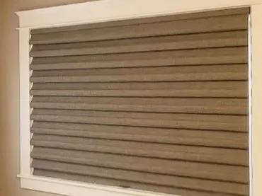 Room darkening roman shade in a Woodinville bedroom