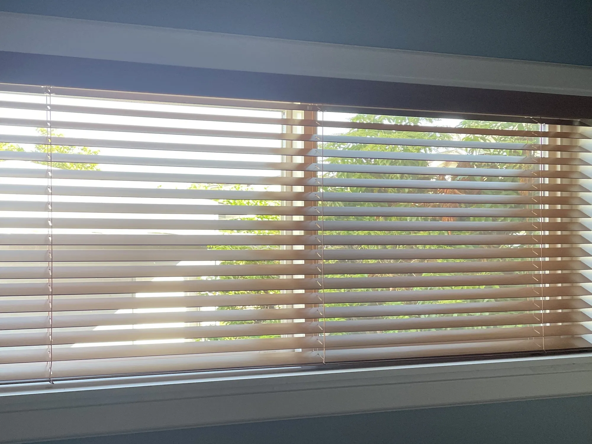 Custom wood blinds installed in a Seattle home office
